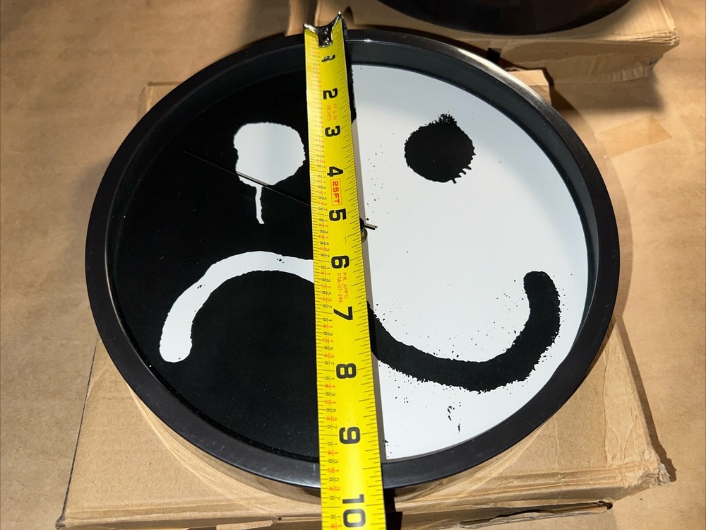 Two Smiley/Frown Wall Clocks - 9.75” Diameter