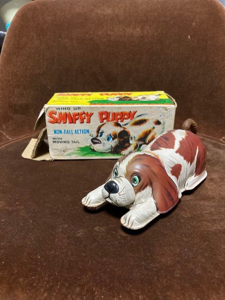 Tin wind-up toy dog