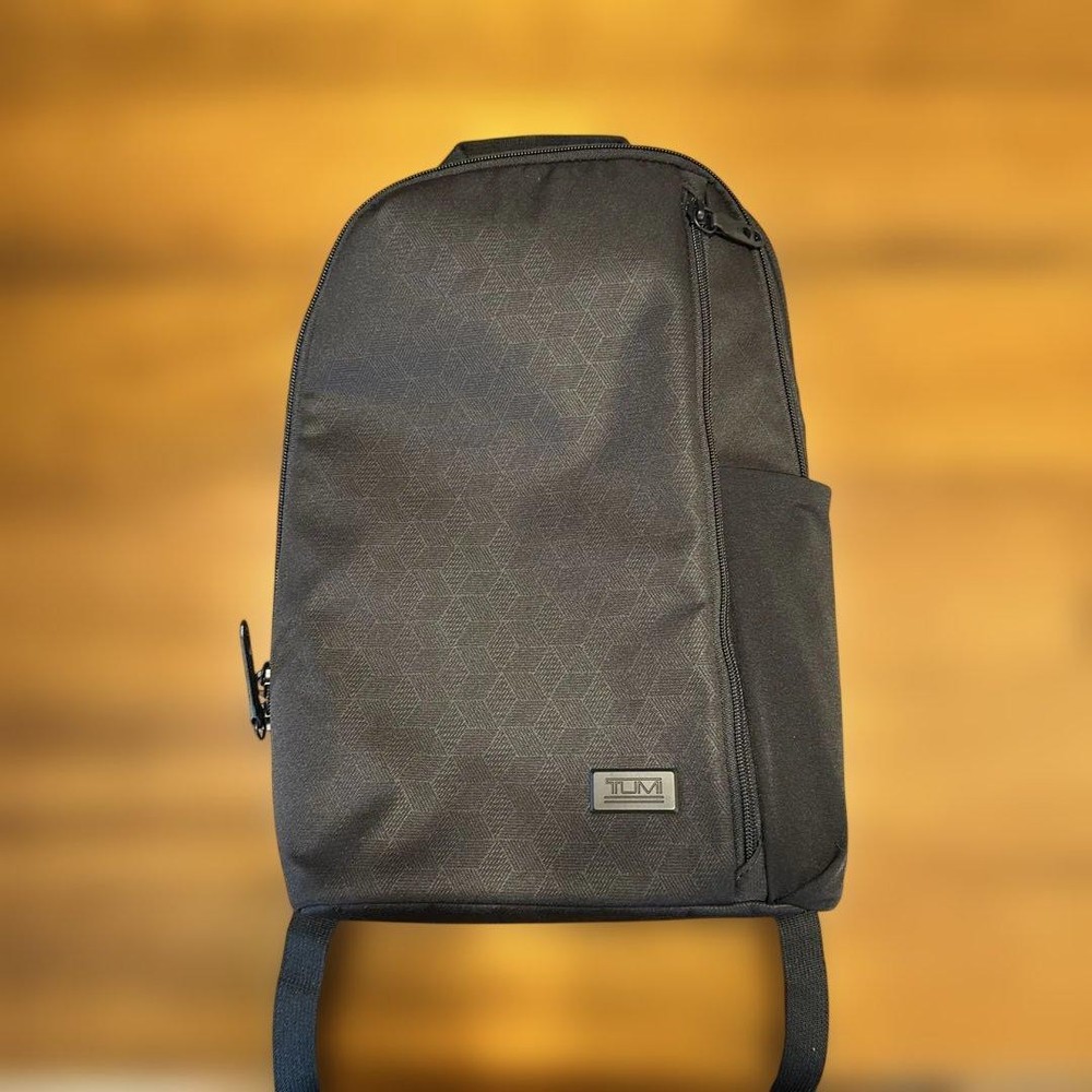 TUMI geometric pattern black backpack