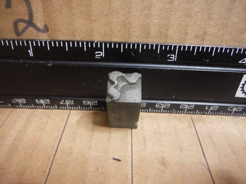 Vintage letterpress printing block