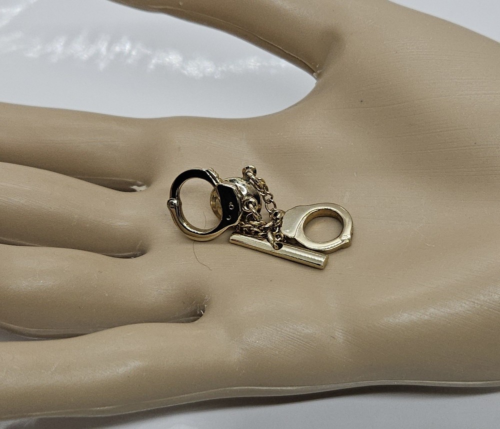 Hand Cuff Gold Tone Lapel Pin