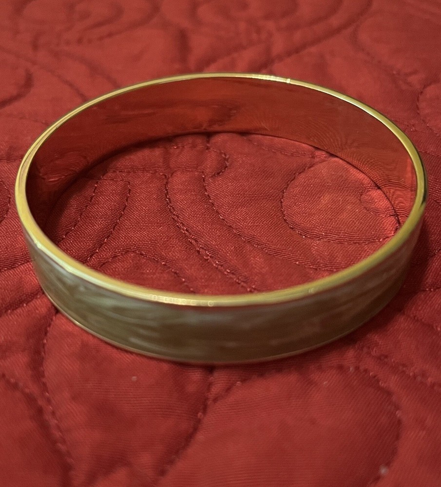 MONET LIGHT GREEN BANGLE BRACELET 2 1/2 DIAMETER.SIGNED.