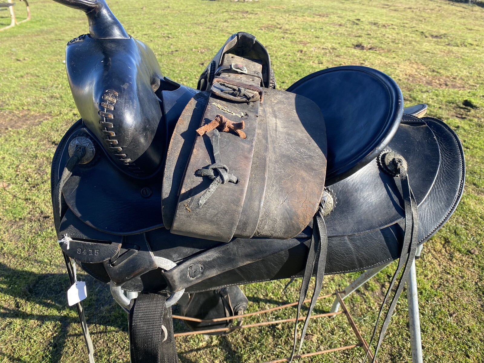Antique/Vintage J. C. Higgins 15.5” slick seat Western saddle w/tapaderos