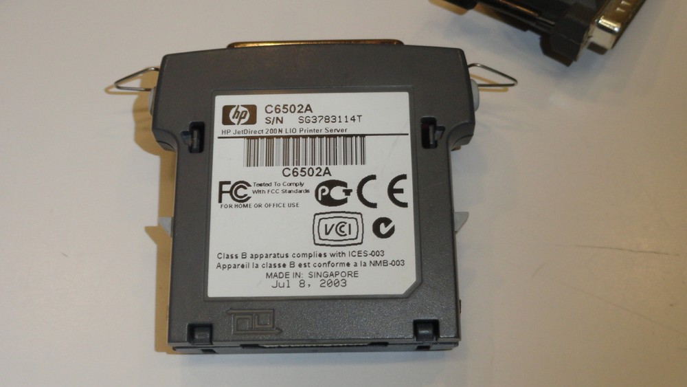 QQ1: HP JetDirect 200N LIO Printer Server C6502A with cable