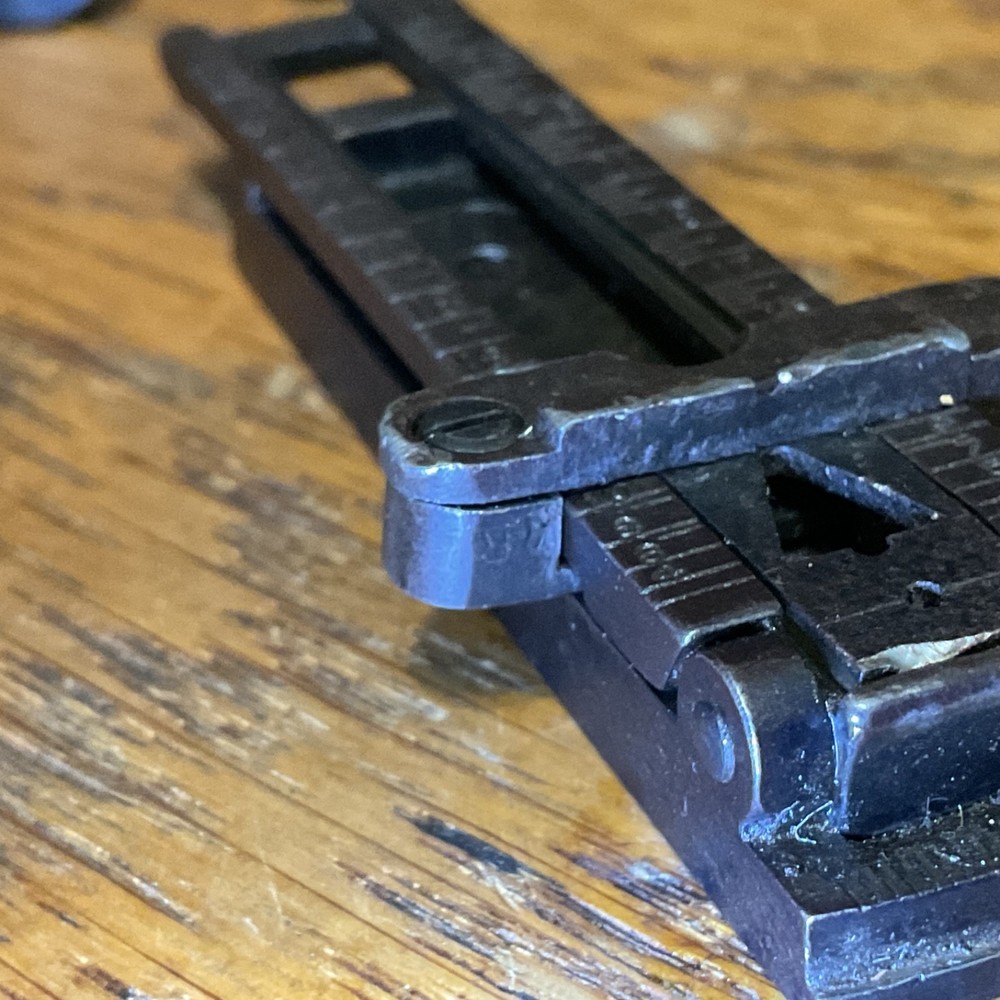 Remington 1903 sight base, leaf, slide, elevation, windage knobs marked R. 1 set