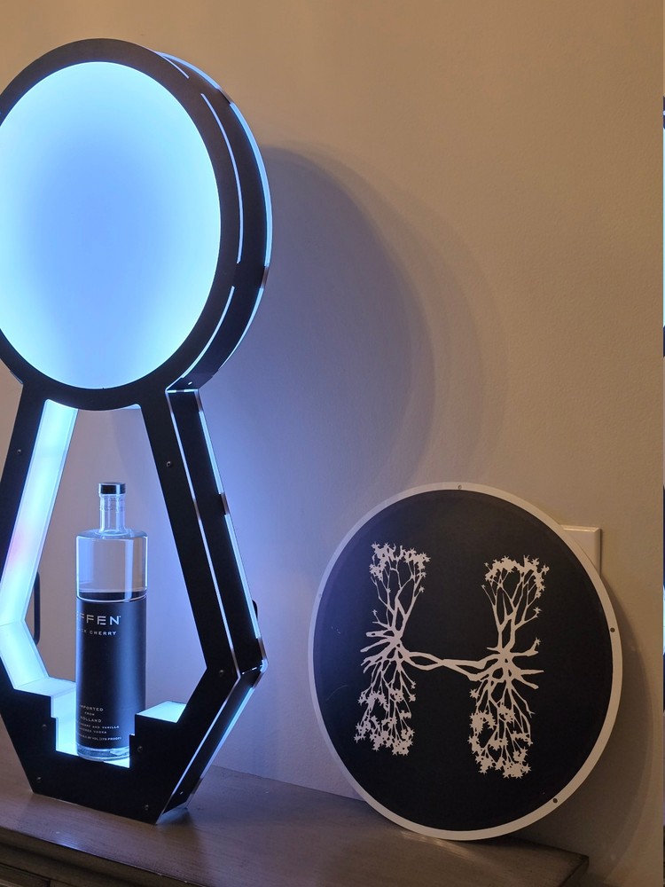 LED Bottle Presenter Display Glorifier. Rechargeable & Wireless. Add your Logo