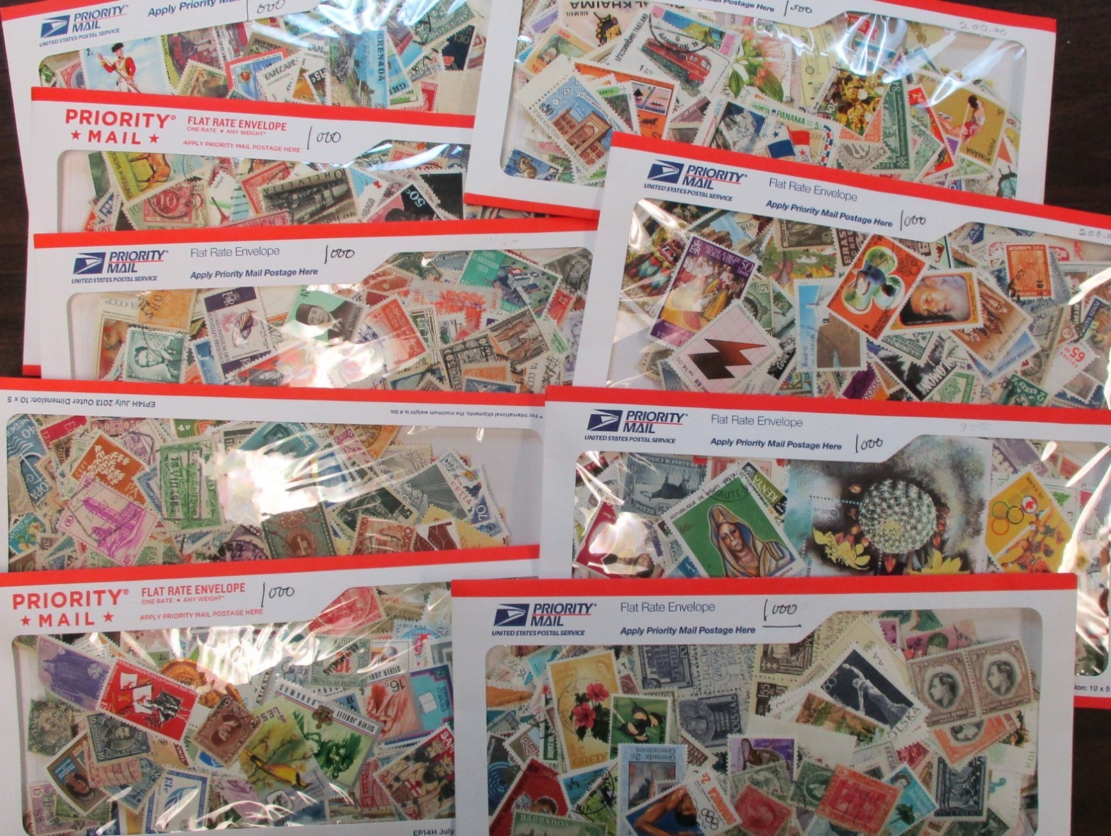 Quality Lot of 1000 Mint/Used Stamps ~ No soaking required!