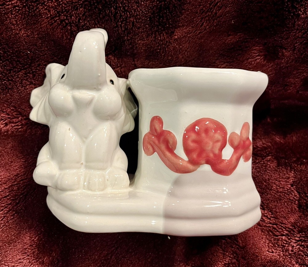 Glazed ceramic elephant planter