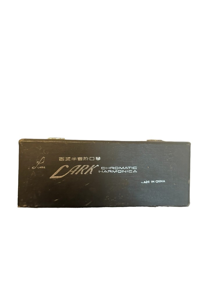 vintage lark harmonica with case