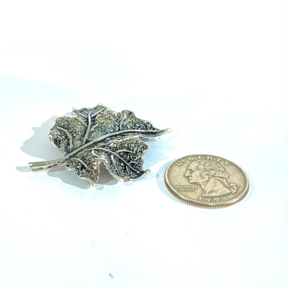 vintage solid silver leaf miniature , hallmarked italian figurine