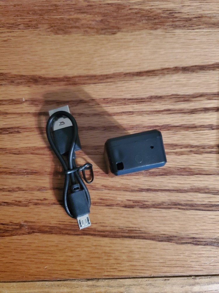 Unbranded GPS Unit, Charge Cord & Pamplet