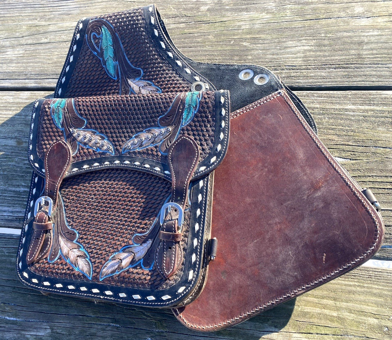 Basket tooled brown leather Western saddle bags with/hand painted feathers