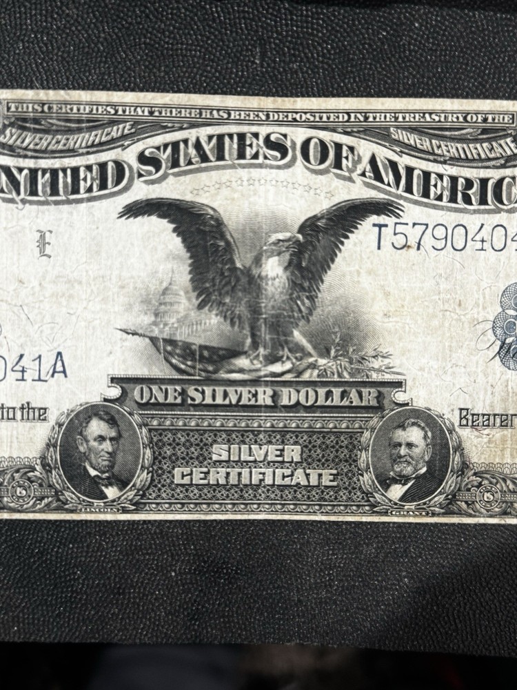 This is an 1899 $1 Silver Certificate, also known as the "Black Eagle" note.