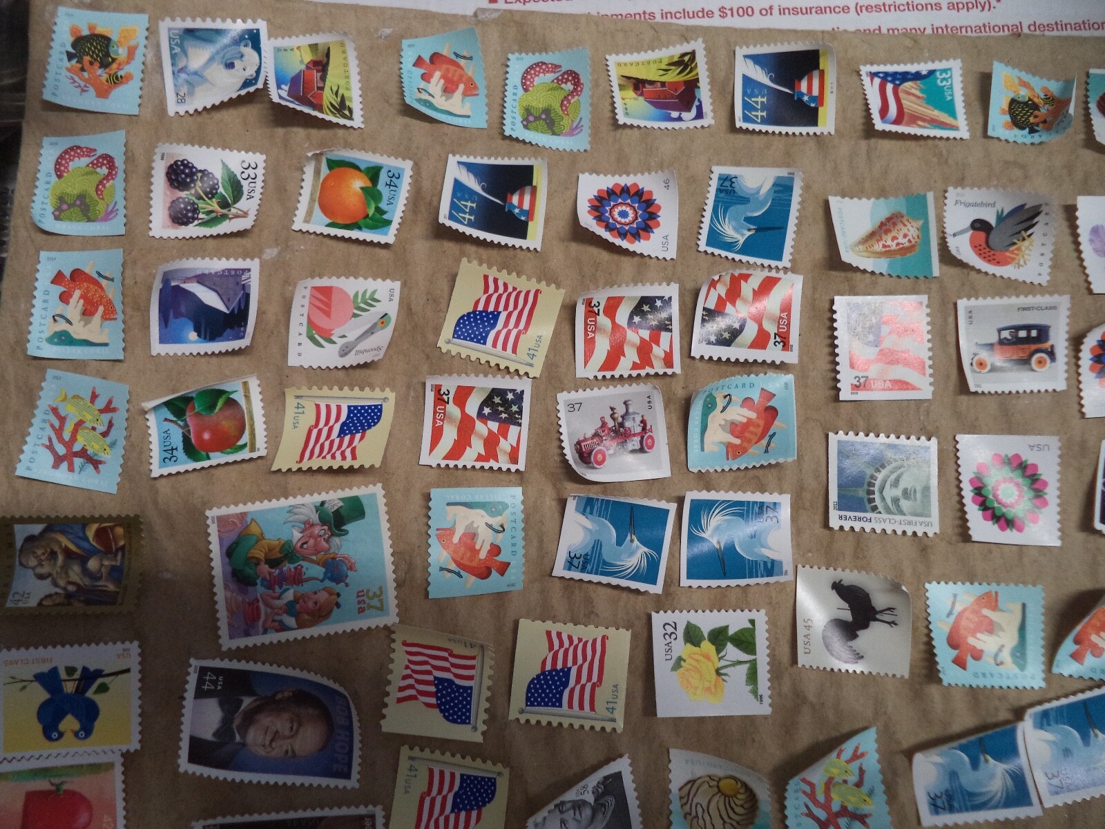 100 GENUINE FOREVER $73 US POSTAGE STAMPS NOT USED AS INTENDED PURPOSE ON PAPER