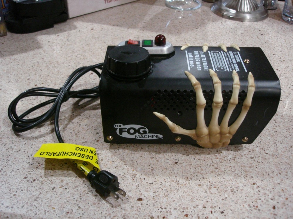 The Fog Machine w/Skeleton Hands EUC