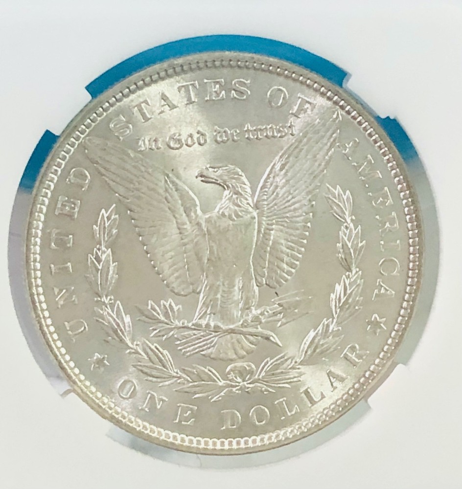 **1887 MORGAN SILVER DOLLAR.**