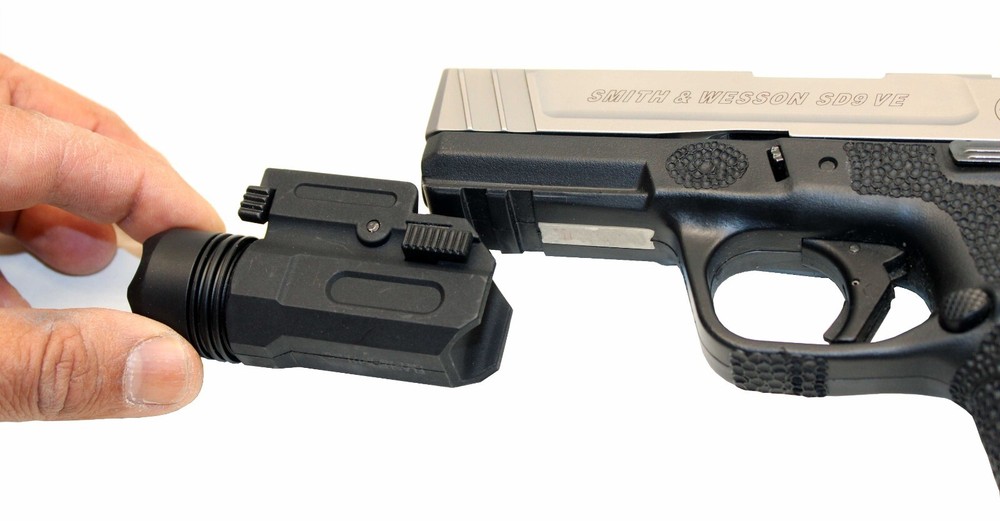 Trinity 300 lumen tactical flashlight for Smith & Wesson M&P 9 shield model.