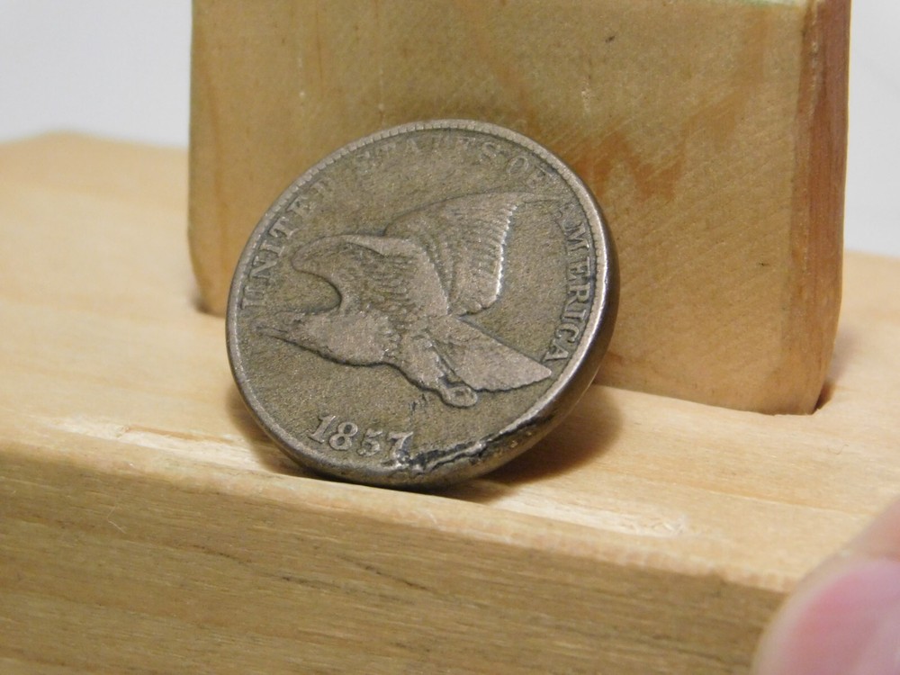 1857 U.S. Flying Eagle cent, lamination error at edge