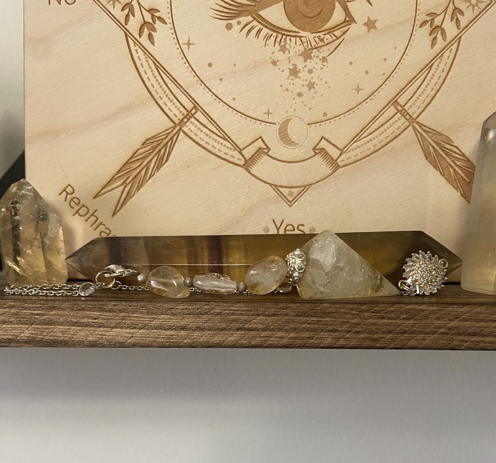Citrine crystal pendulum and pendulum board