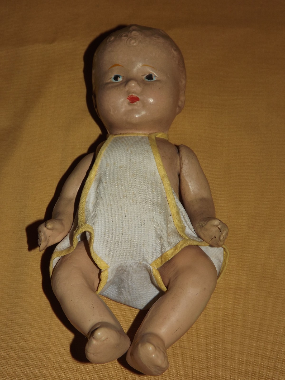 VINTAGE TOY 9" HIGH COMPOSITE BABY DOLL IN SUNSUIT