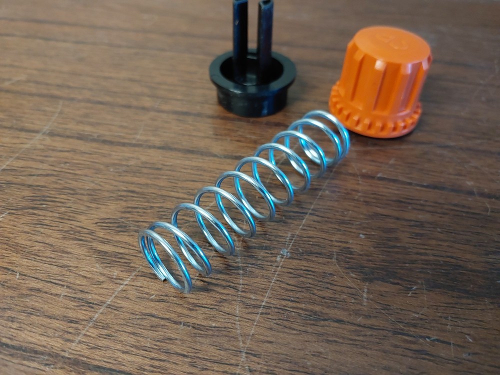 BLACK+DECKER LST140 40V String Trimmer - Replacment Handle Lock Button Assembly