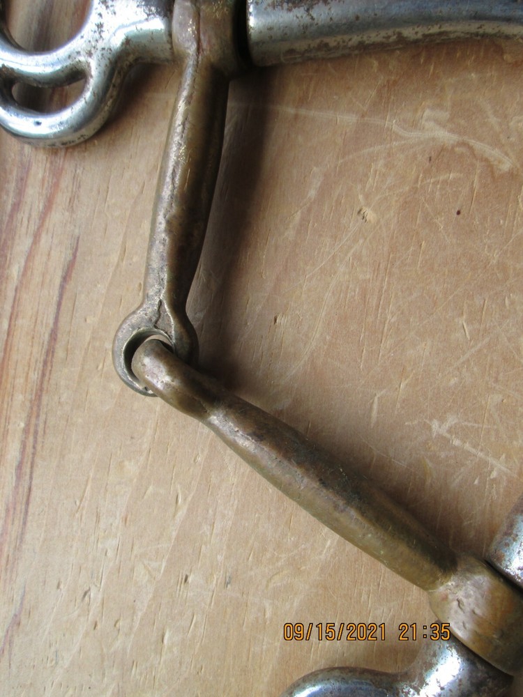 rusty iron & brass horse bit decor
