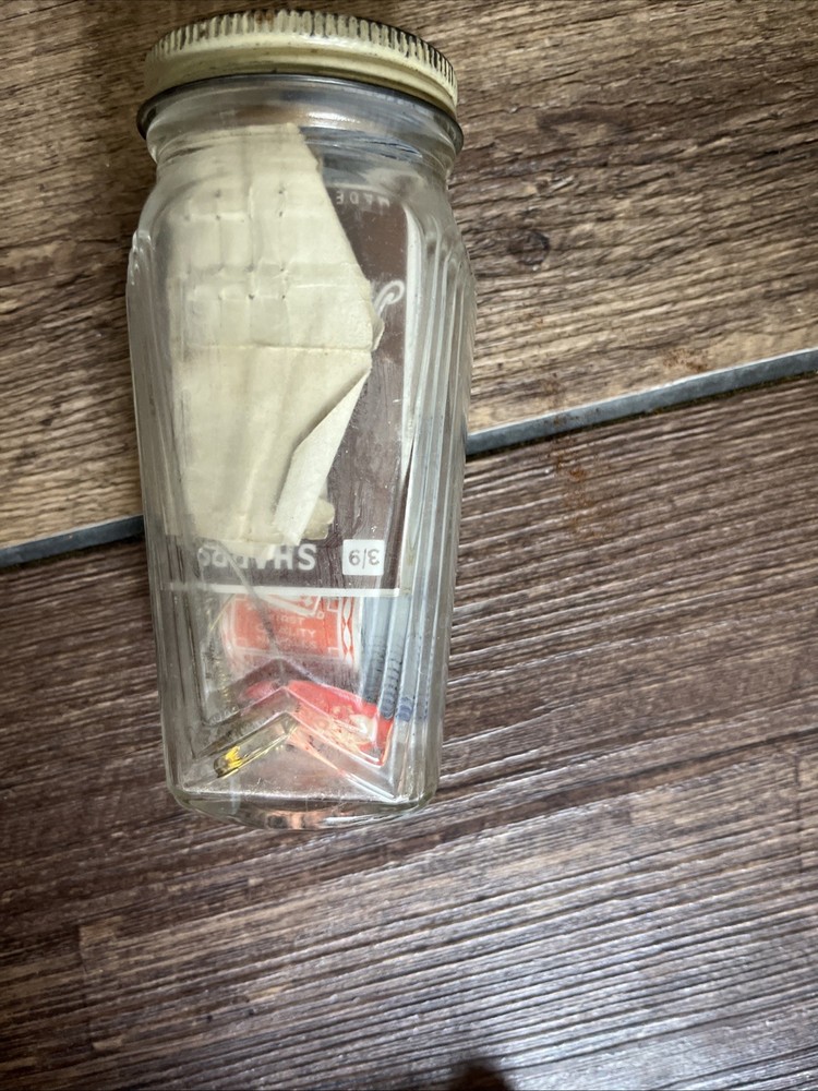VINTAGE GLASS BOTTLE - SKYSCRAPER STEP DESIGN