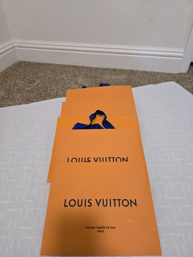 Assorted Louis Vuitton packaging