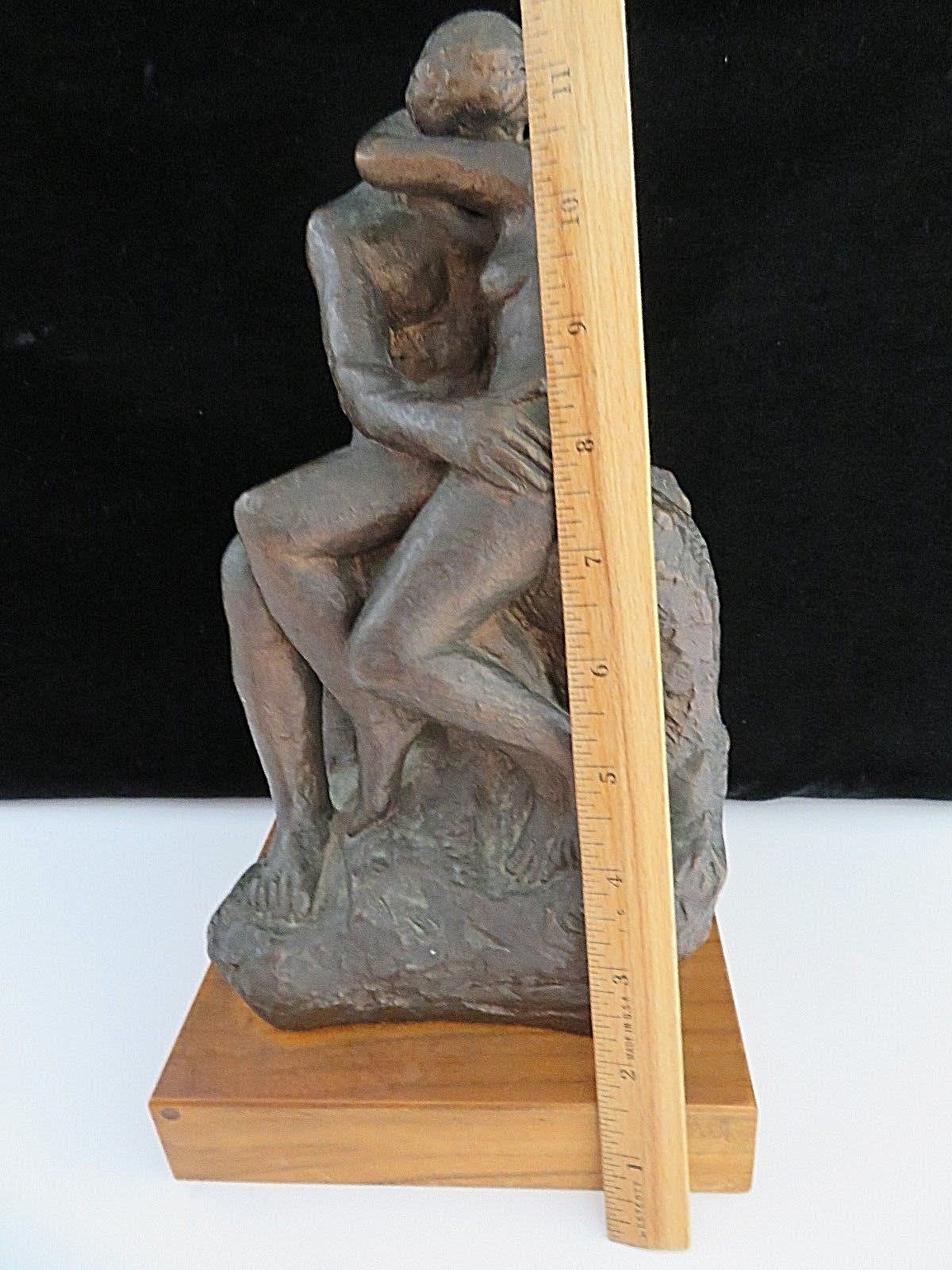 The Kiss Molded Statue on Wood Base