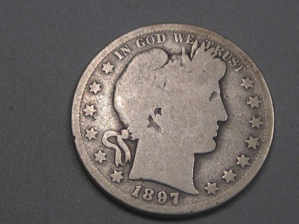 Better-date 1897-s Silver BARBER Half Dollar.