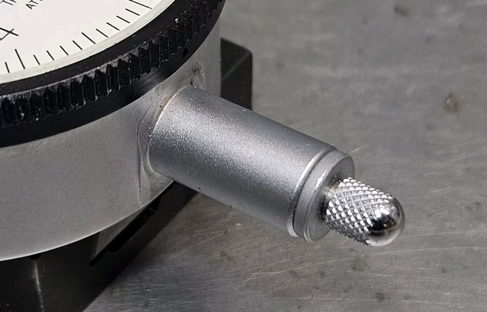 Starrett No. 25-111 dial indicator with No. 674-2 adjustable mounting bracket