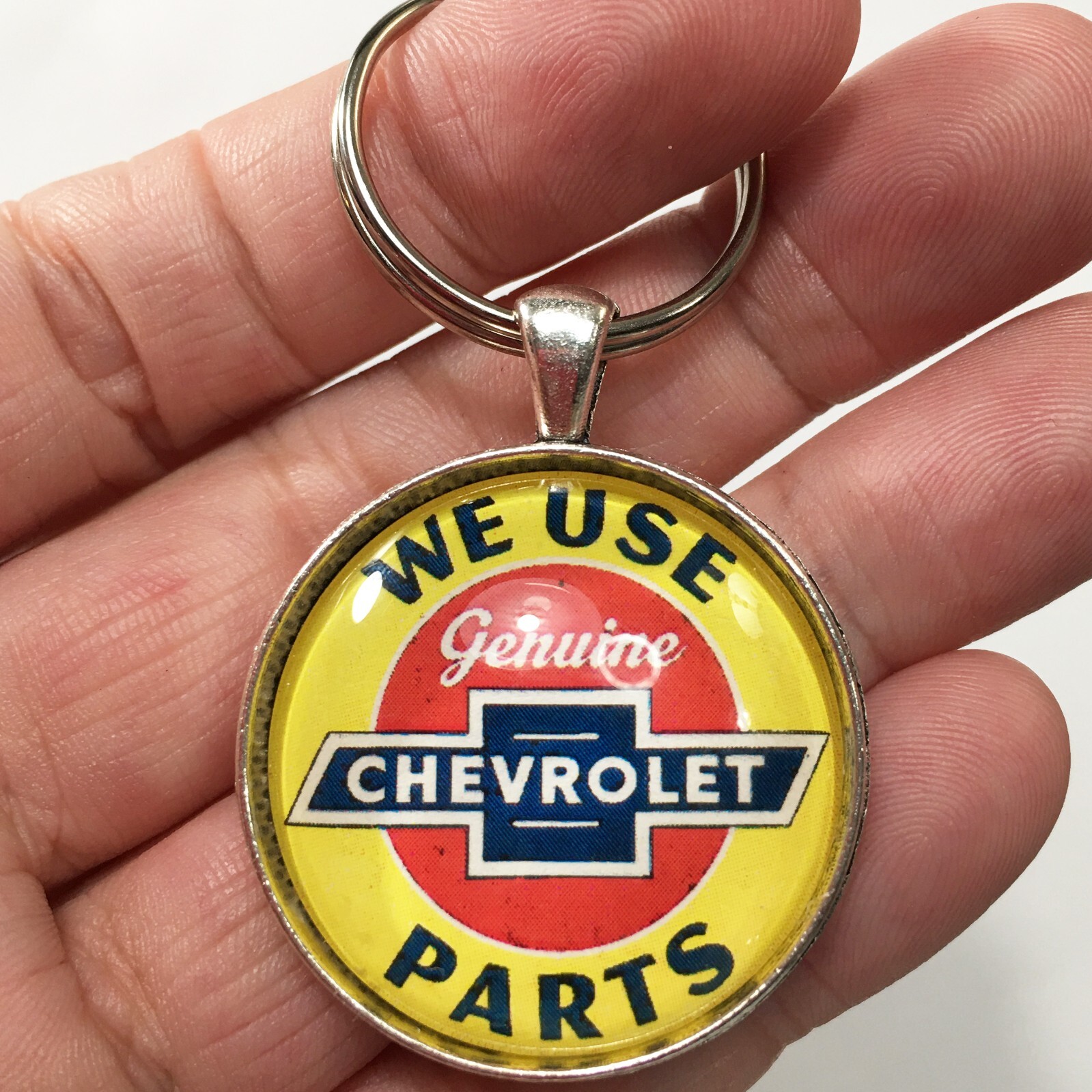 Vintage We Use Genuine Chevrolet Parts Sign Chevy bowtie Keychain Reproduction