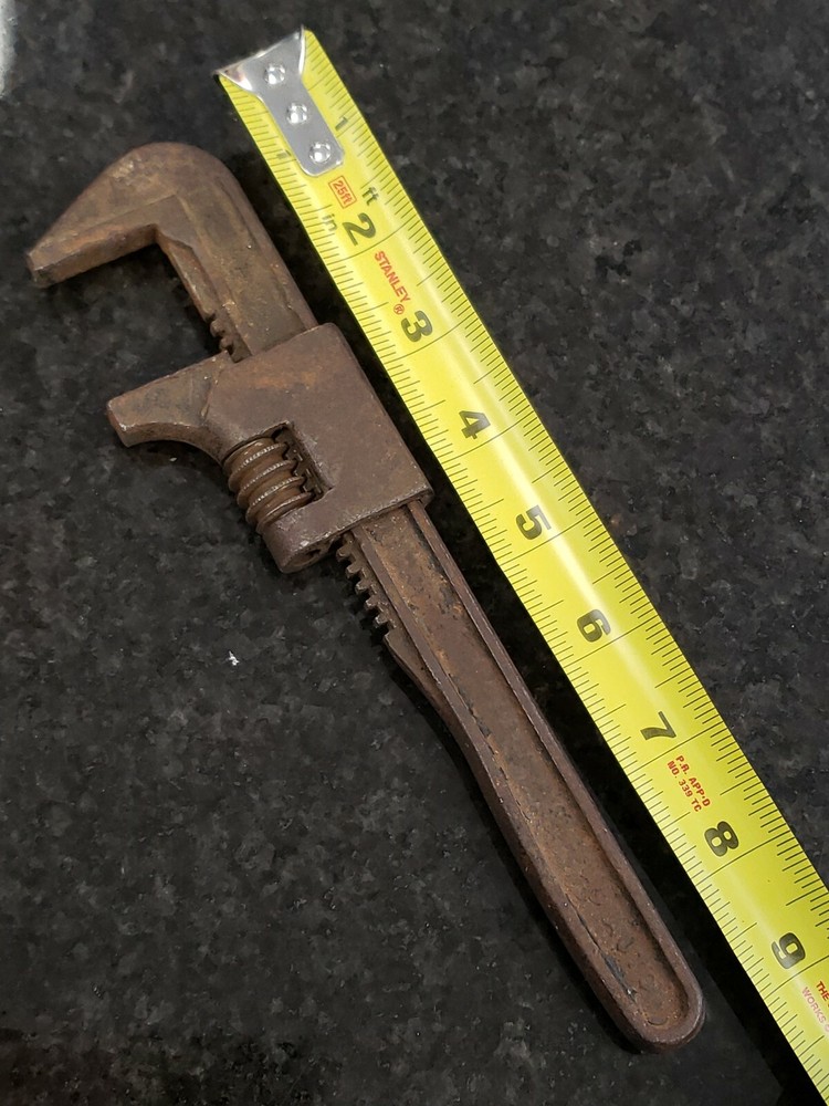 vintage pipe wrench opens to 2.5"