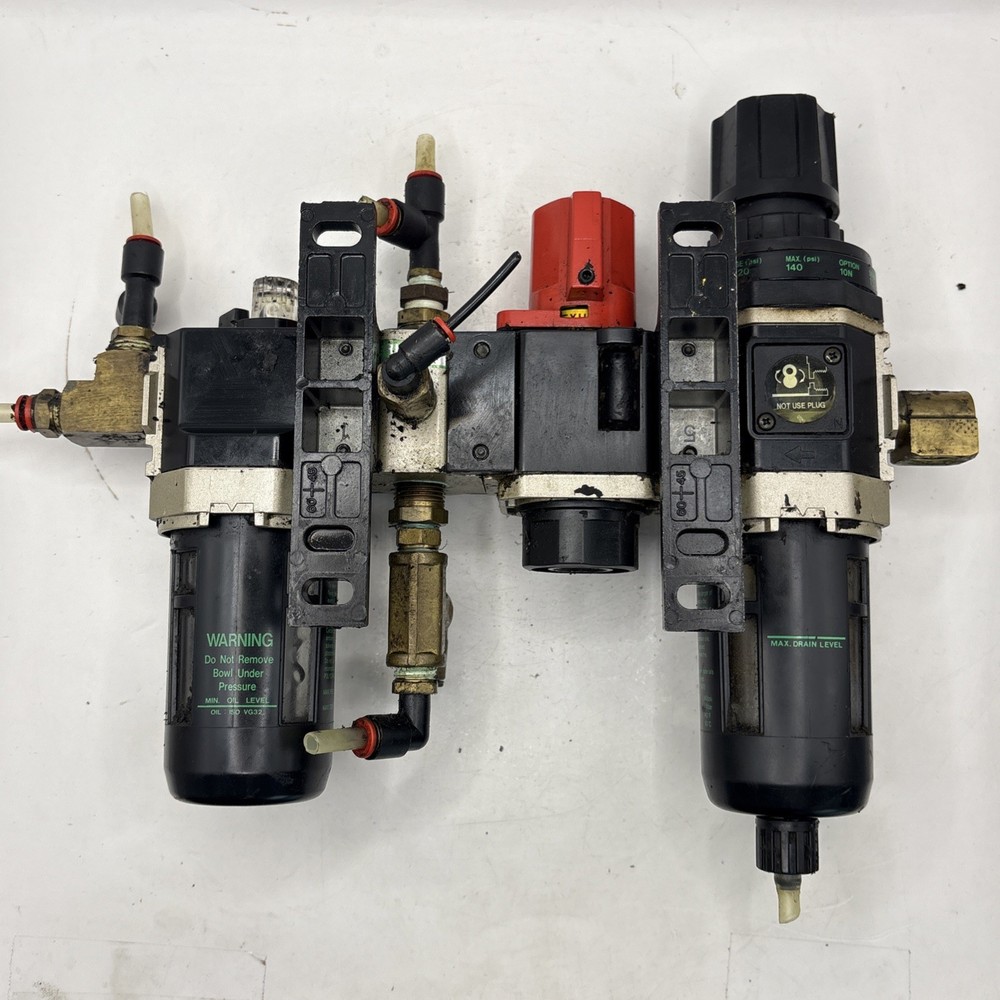 Miller Filter Regulator, Exhaust Valve, Distributor, And Lubricator Assembly