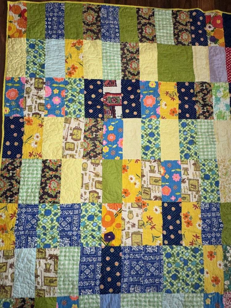 handmade multicolored cotton patchwork quilt featuring a reversible design7by7.5