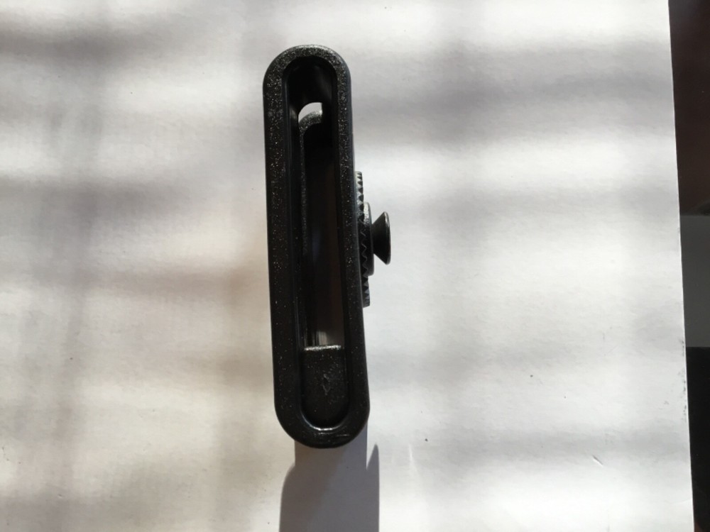 ITac paddle holster belt loop adapter.