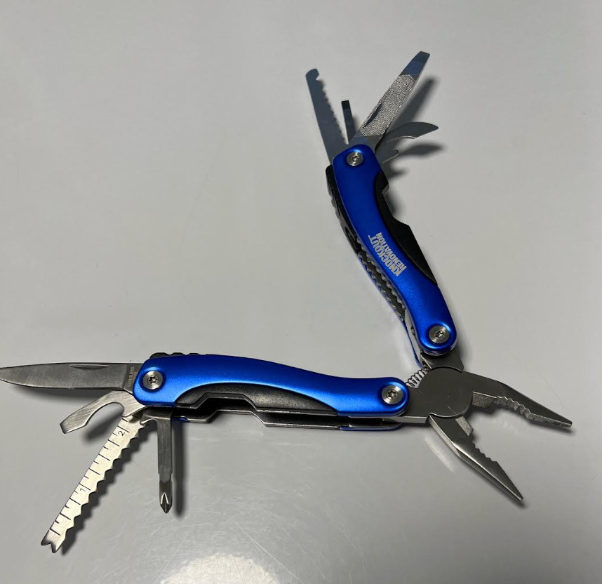 Folding multi-tool blue pocket knife with case.