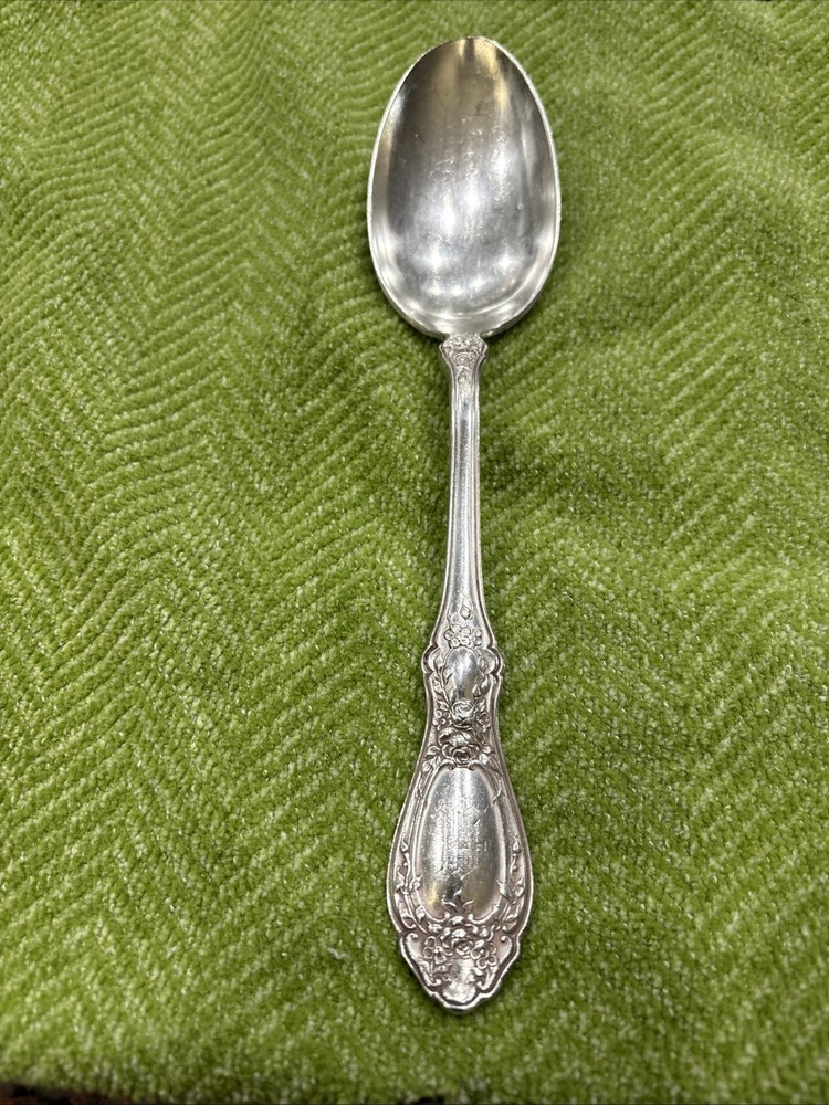 4 silver plate Rogers serving spoons