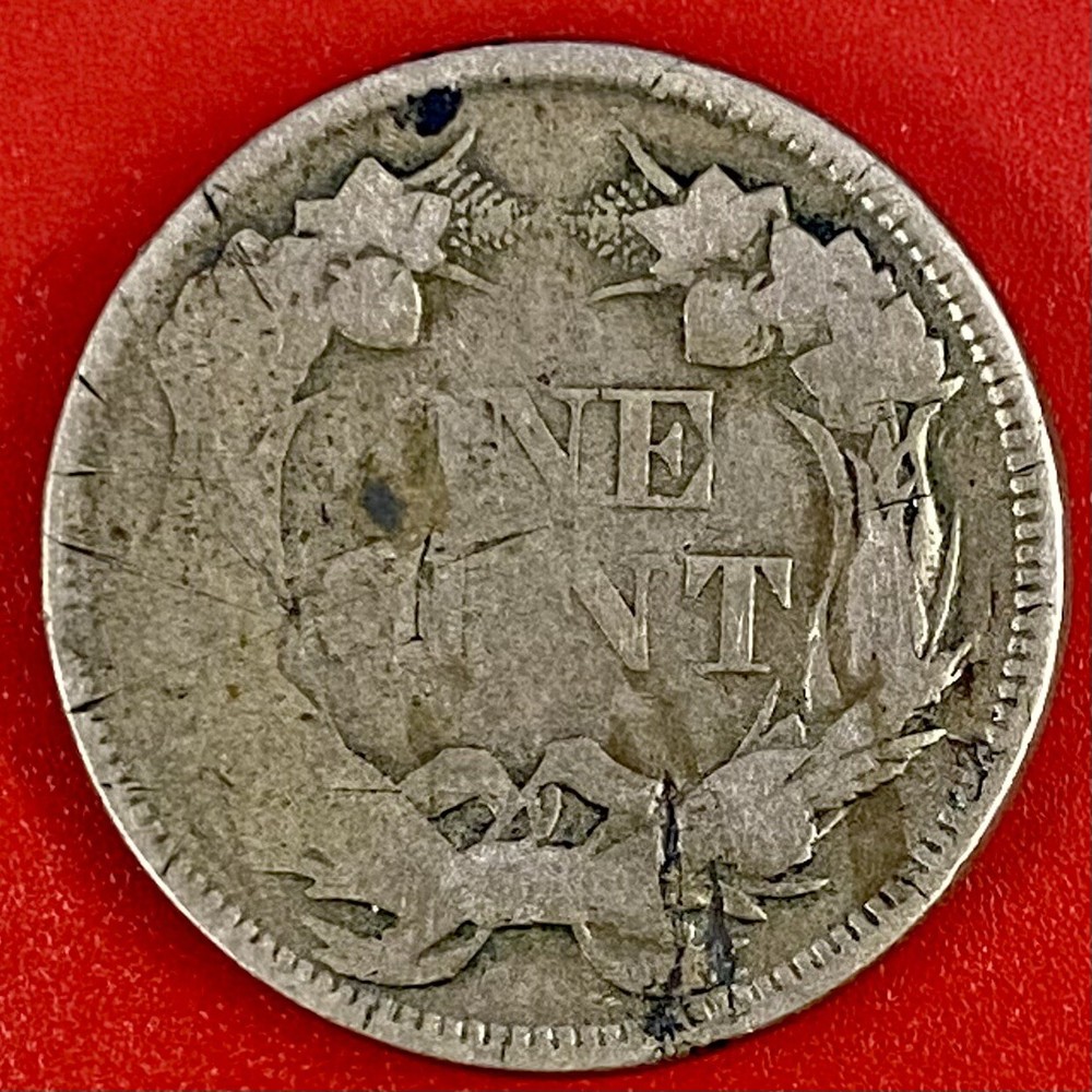 1857 FLYING EAGLE CENT, FILLED DIES ERROR