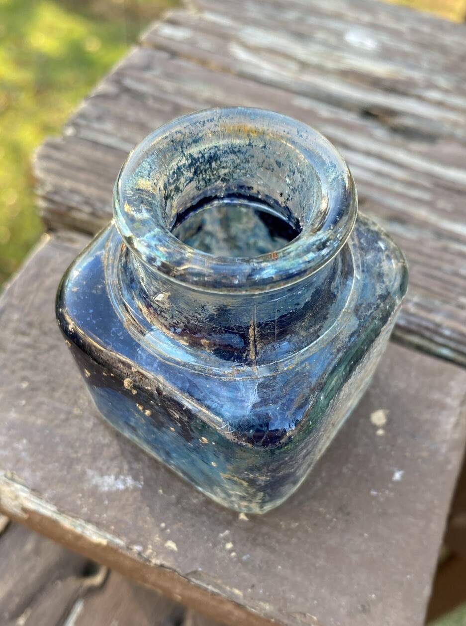 Clear Inkwell With Blue Ink And Partial Label
