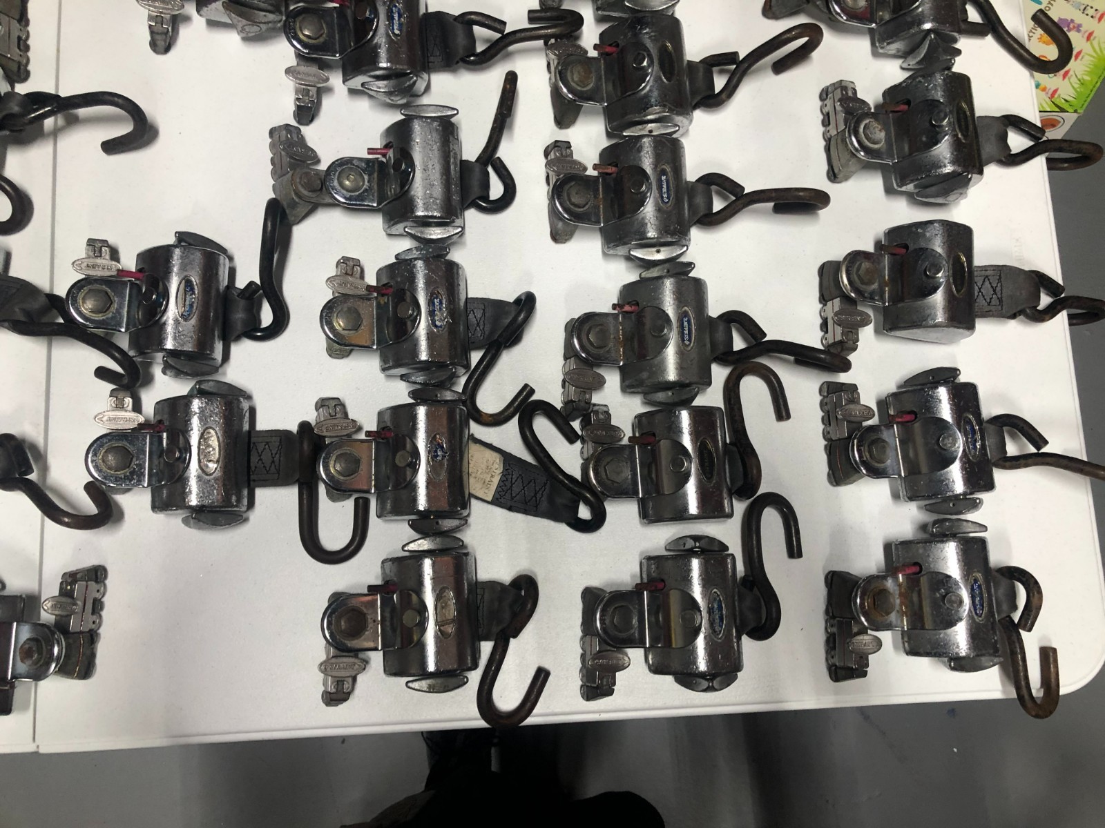 Q'Straint Wheelchair Securement tie Down Retractors.