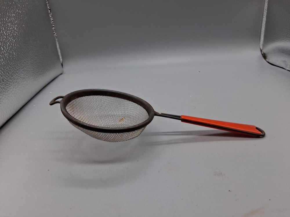 MCM Orange Vintage Bakelite Strainer