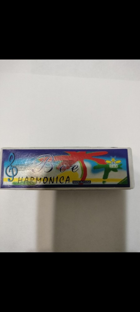 LIP HARMONICA SMALL POCKET SIZE LIGHT WEIGHT COMFORTABLE NEW IN BOX.