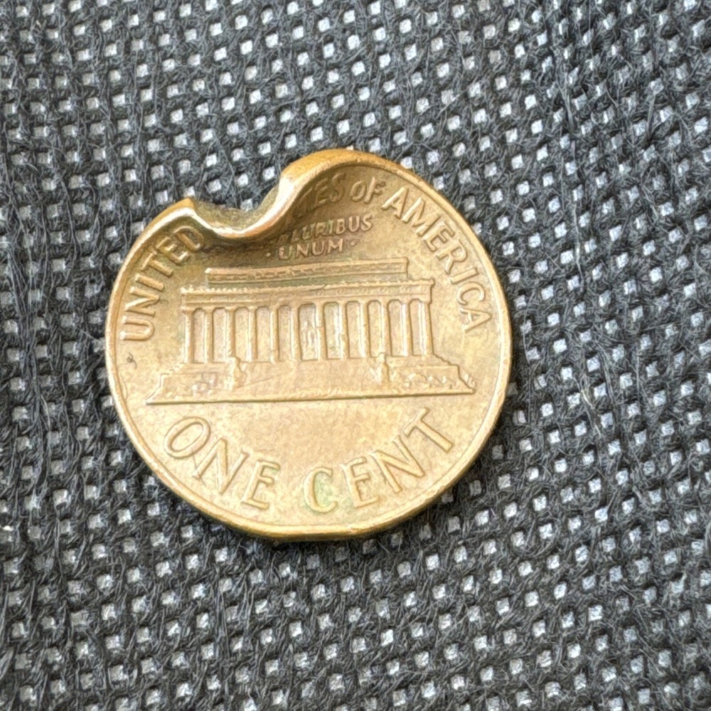 1969 D Penny with Bullet Damage